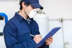 Plumber,At,Work,Wearing,A,Mask,,Coronavirus,Concept